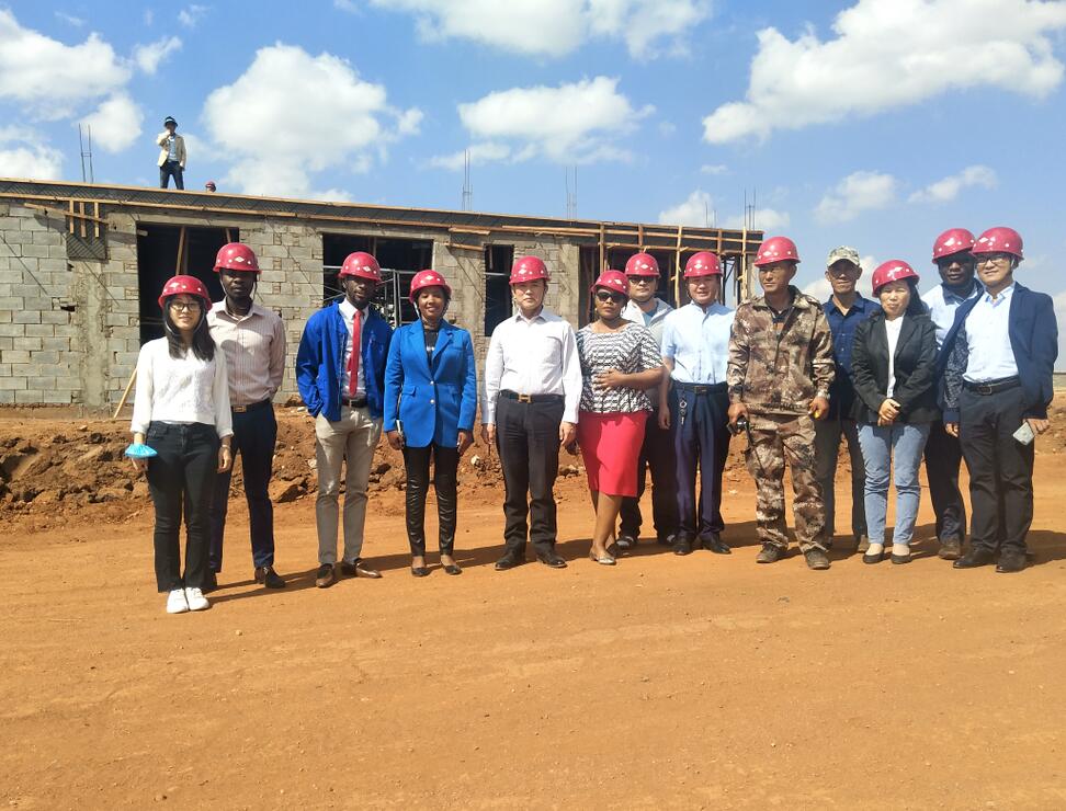 Leaders of company visiting site1