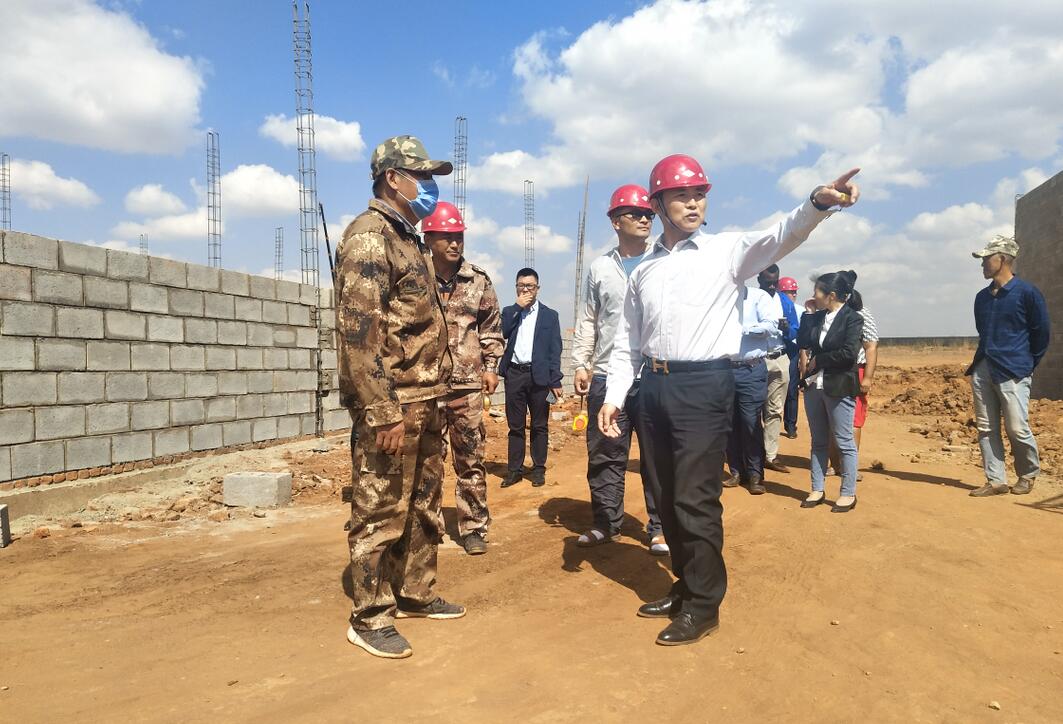 Leaders of company visiting site2
